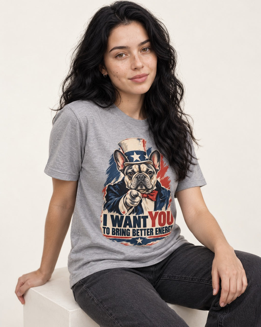 Frenchie I Want You to Bring Better Energy Recruitment Poster Graphic T-Shirt in Sport Grey, worn by a seated model