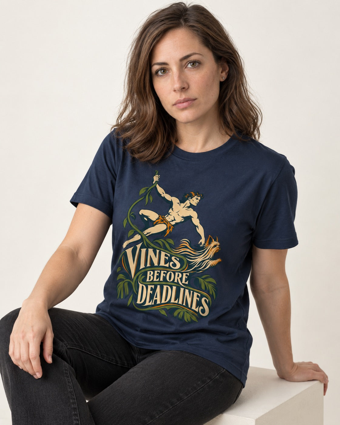 Yorkshire Terrier Vines Before Deadlines Jungle Hero Graphic T-Shirt in Navy, worn by a seated model