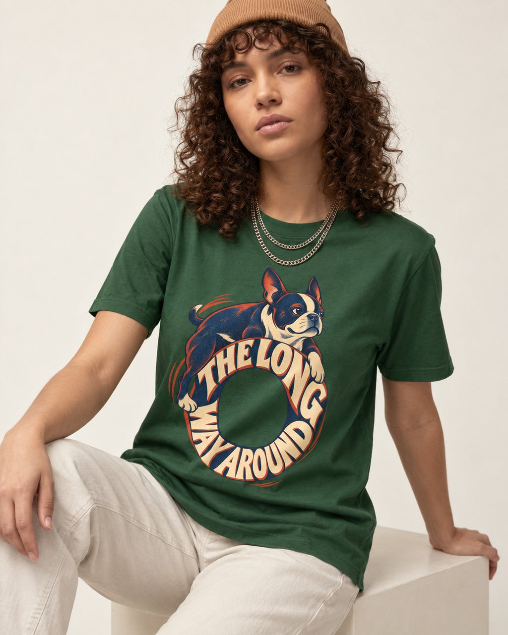 Boston Terrier the Long Way Around T-Shirt in Forest Green, worn by a seated model
