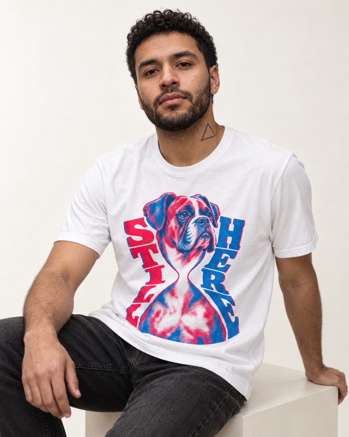 Stay Here Boxer Duotone Portrait T-Shirt in White, worn by a seated model