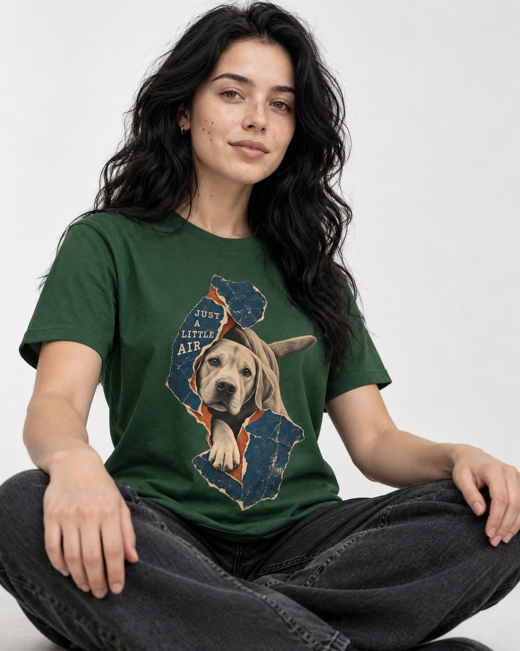 Labrador Retriever Just a Little Air Torn Paper Graphic T-Shirt in Forest Green, worn by a seated model