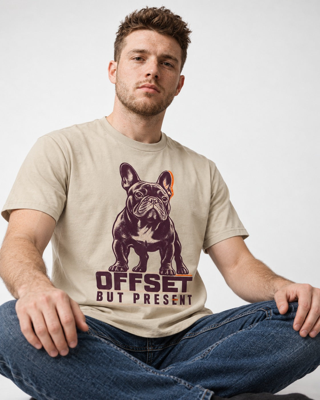 Offset but Present Frenchie T-Shirt in Sand, worn by a seated model
