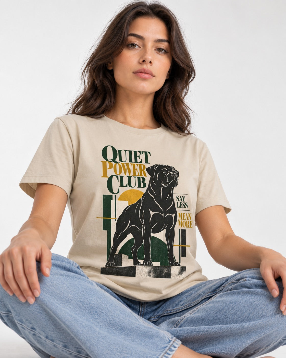 Rottweiler Quiet Power Club T-Shirt in Sand, worn by a seated model
