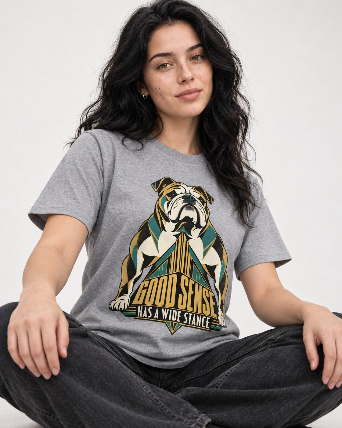 Good Sense Has a Wide Stance English Bulldog Graphic T-Shirt in Sport Grey, worn by a seated model