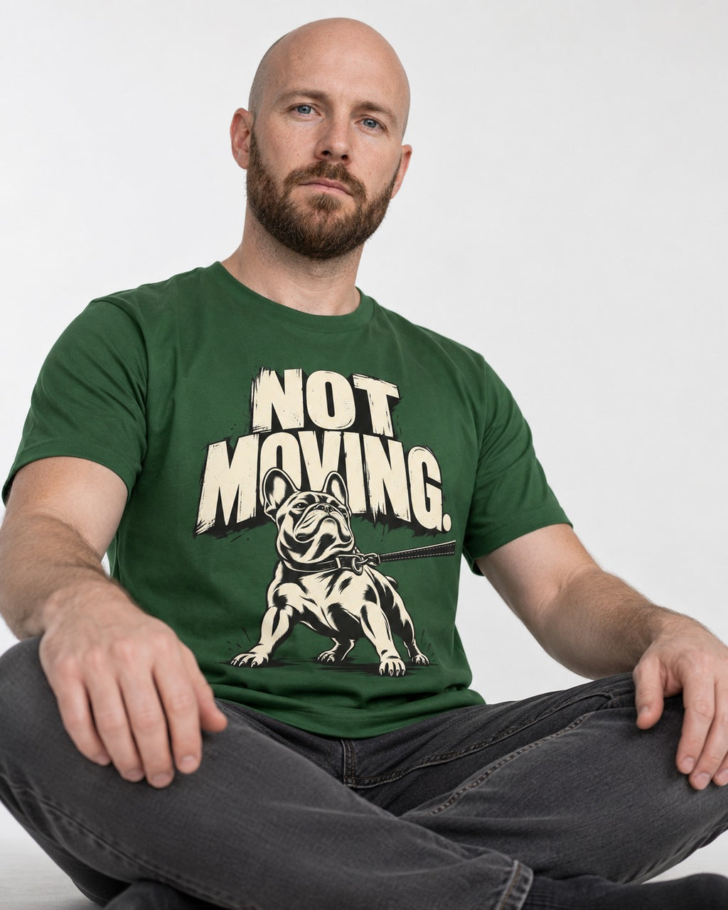 Frenchie Not Moving Taut Leash Poster T-Shirt in Forest Green, worn by a seated model