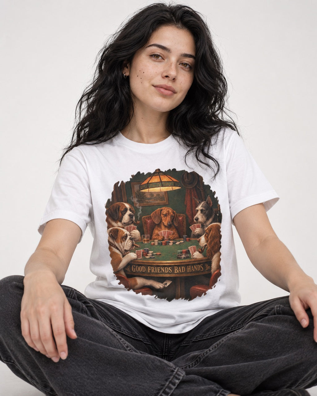 Dachshund Good Friends Bad Hands Poker Scene T-Shirt in White, worn by a seated model