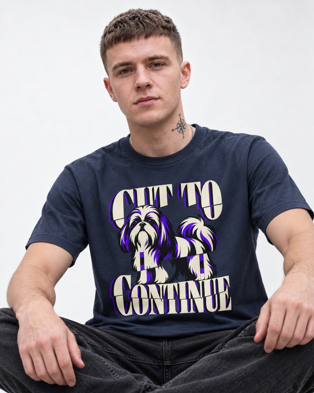 Shih Tzu Cut to Continue Dimensional Typography Graphic T-Shirt in Navy, worn by a seated model