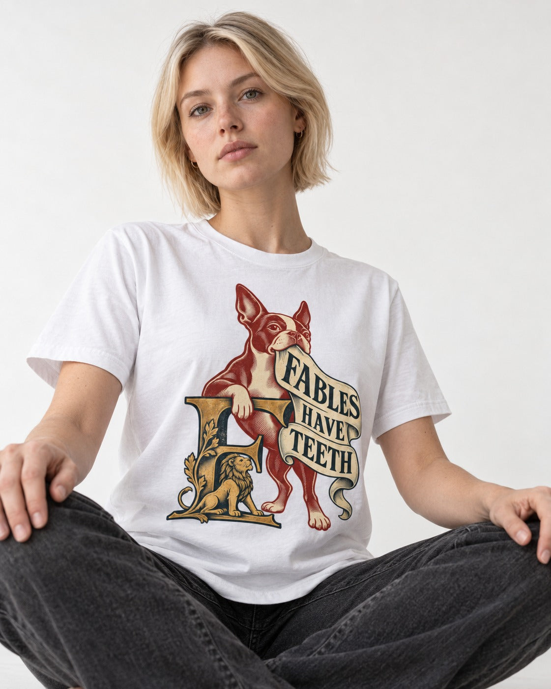 Boston Terrier Fables Have Teeth T-Shirt in White, worn by a seated model