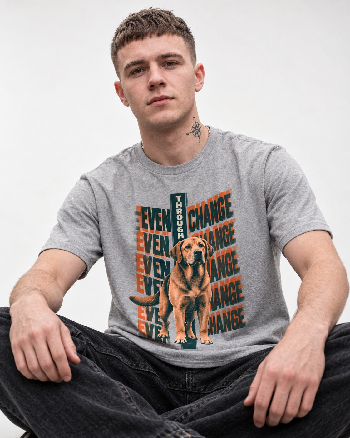 Labrador Retriever Even Through Change Repeated Poster Graphic T-Shirt in Sport Grey, worn by a seated model