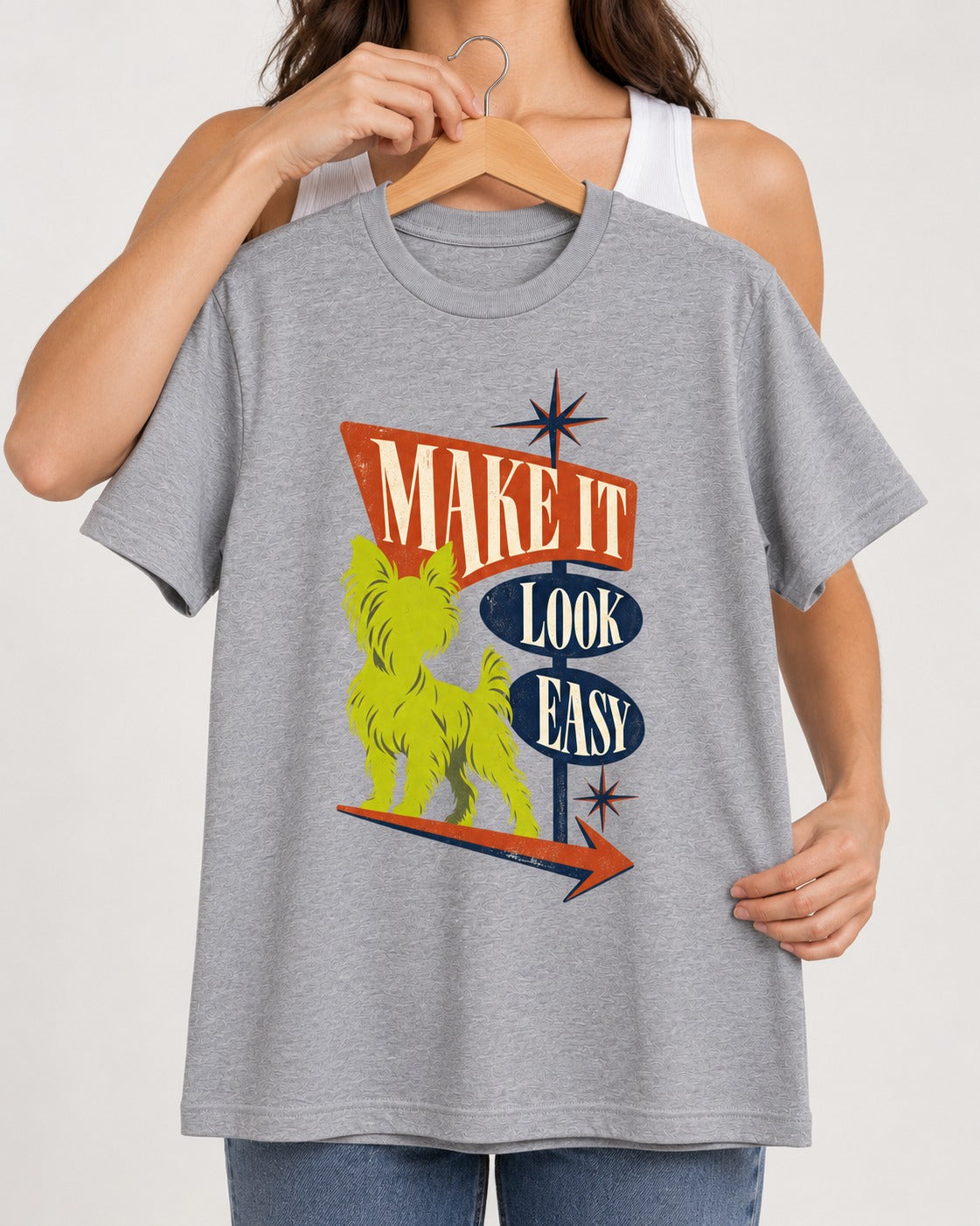 Yorkshire Terrier Make It Look Easy Retro Sign Graphic T-Shirt in Sport Grey, held up on a hanger