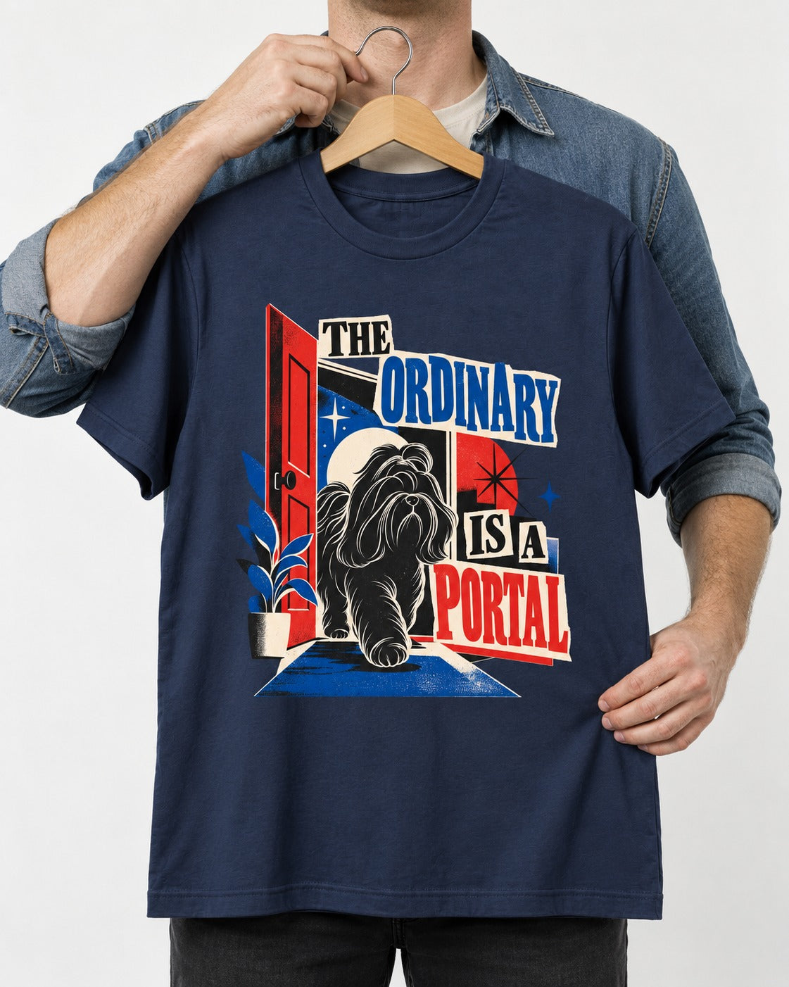 Shih Tzu The Ordinary Is a Portal Door Graphic T-Shirt in Navy, held up on a hanger
