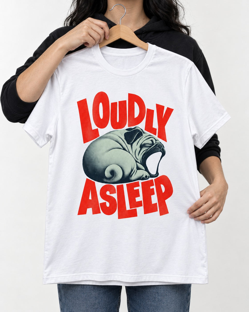Pug Loudly Asleep Curled Yawn Graphic T-Shirt in White, held up on a hanger