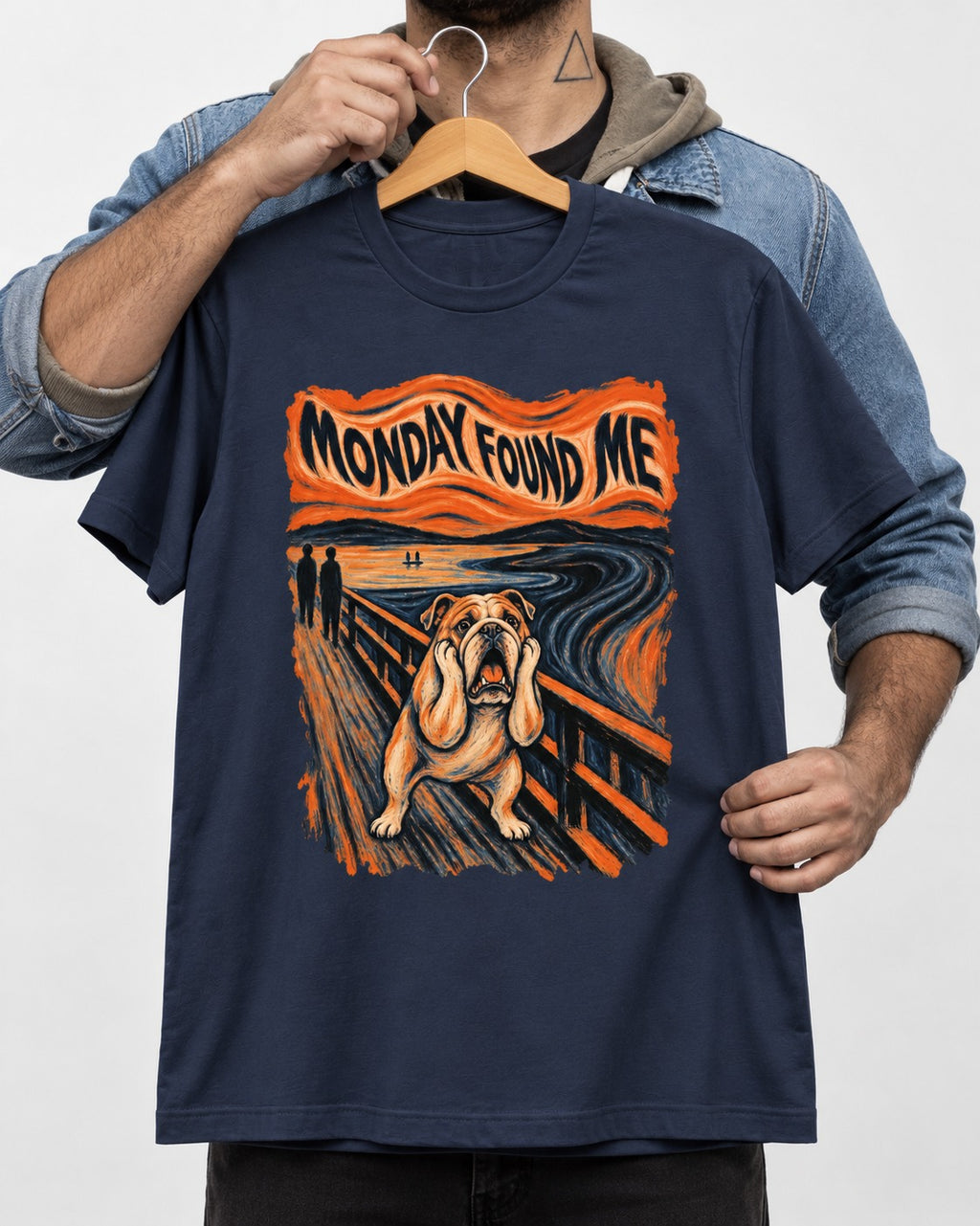 English Bulldog Monday Found Me Scream Graphic T-Shirt in Navy, held up on a hanger