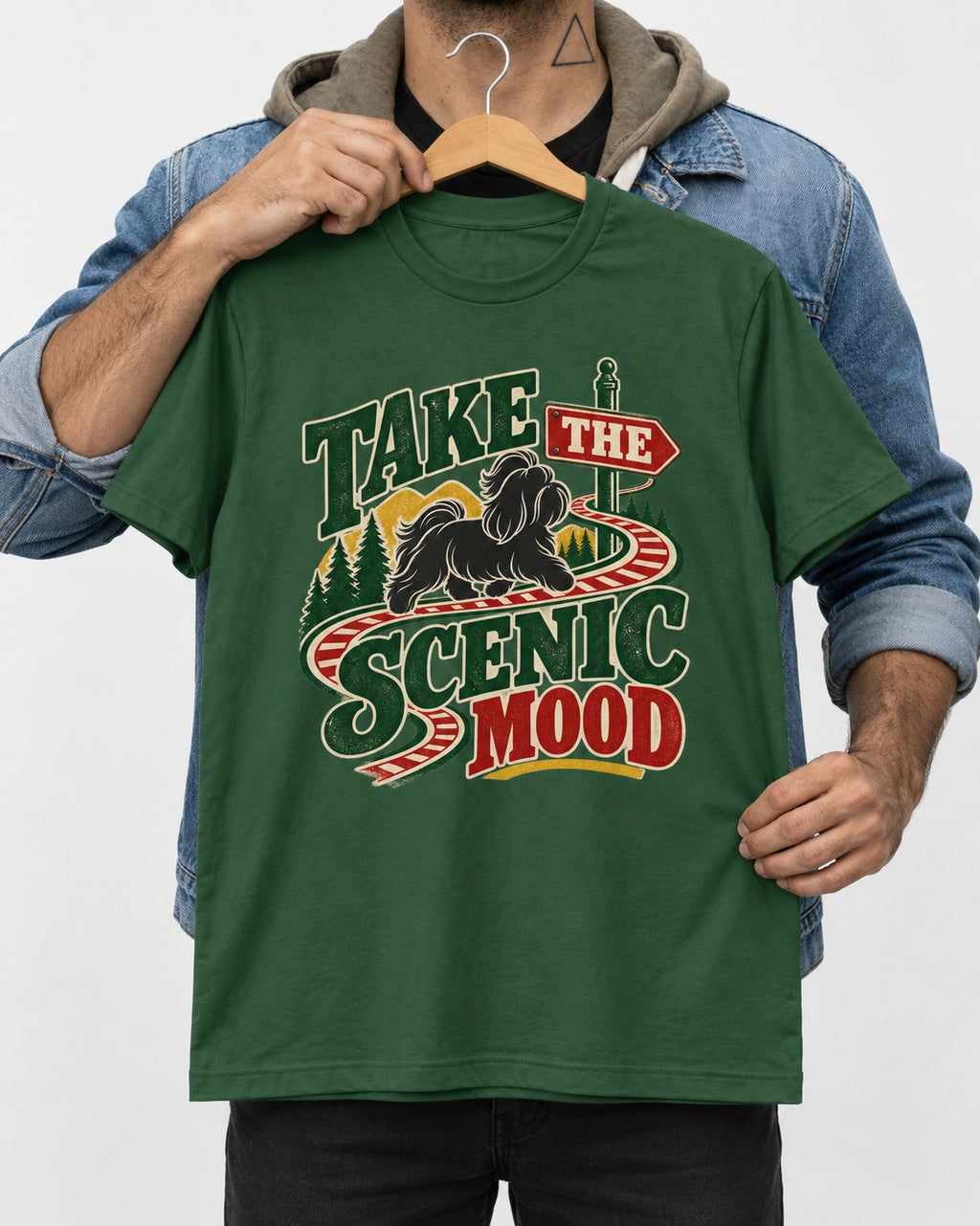 Shih Tzu Take the Scenic Mood Road Sign Graphic T-Shirt in Forest Green, held up on a hanger