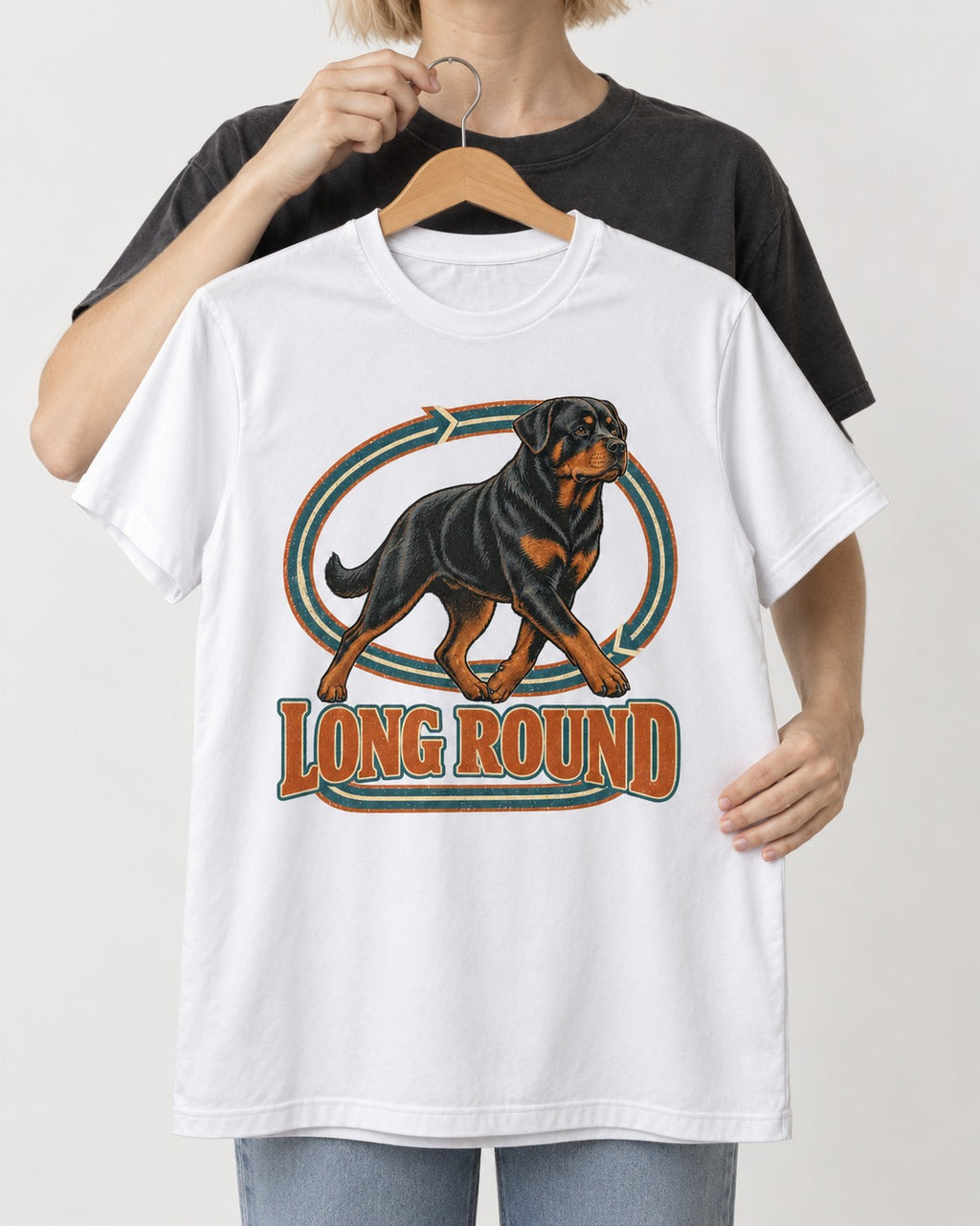 Rottweiler Long Round Circular Track Graphic T-Shirt in White, held up on a hanger