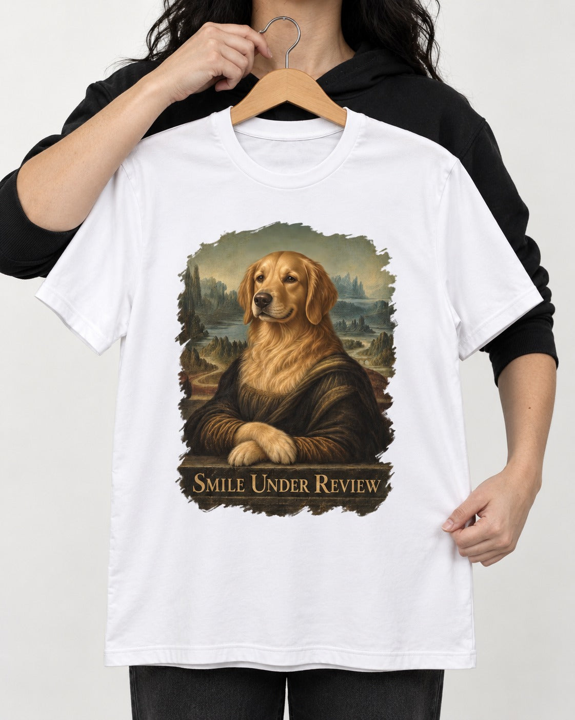 Smile Under Review Renaissance Portrait Golden Retriever Graphic T-Shirt in White, held up on a hanger