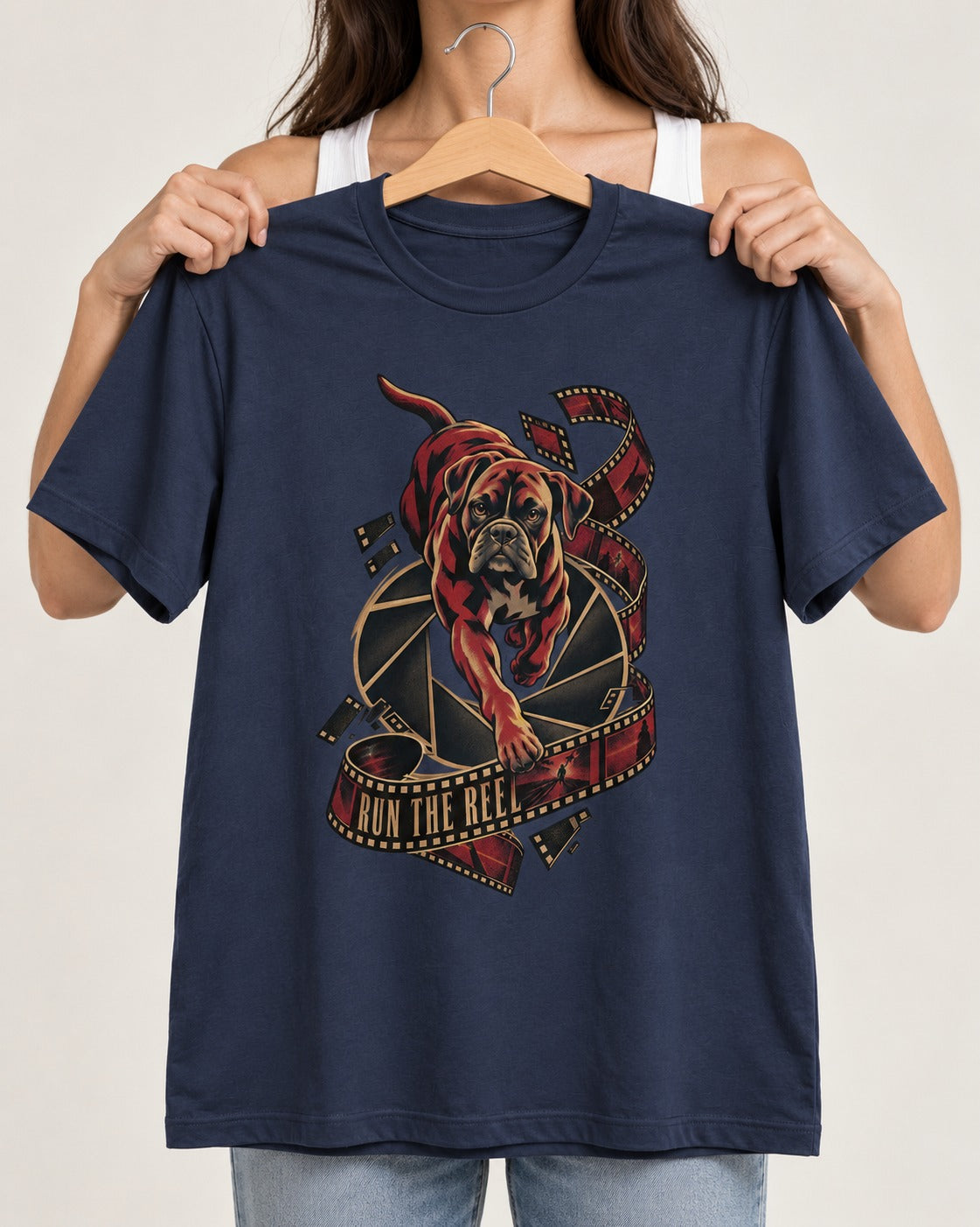 Run the Reel Boxer Film Graphic T-Shirt in Navy, held up on a hanger