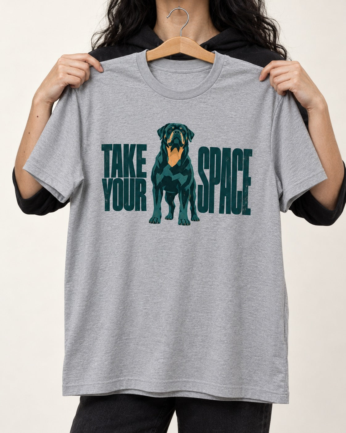 Rottweiler Take Your Space T-Shirt in Sport Grey, held up on a hanger
