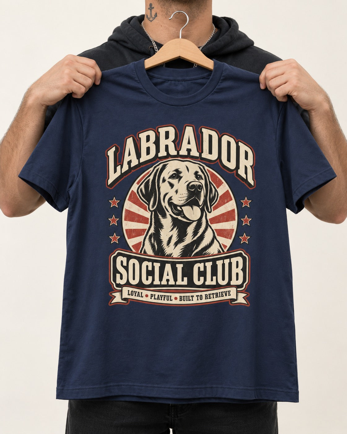 Labrador Retriever Social Club Loyal Playful Built to Retrieve Badge Graphic T-Shirt in Navy, held up on a hanger
