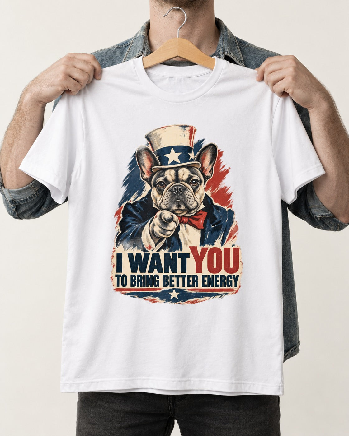 Frenchie I Want You to Bring Better Energy Recruitment Poster Graphic T-Shirt in White, held up on a hanger