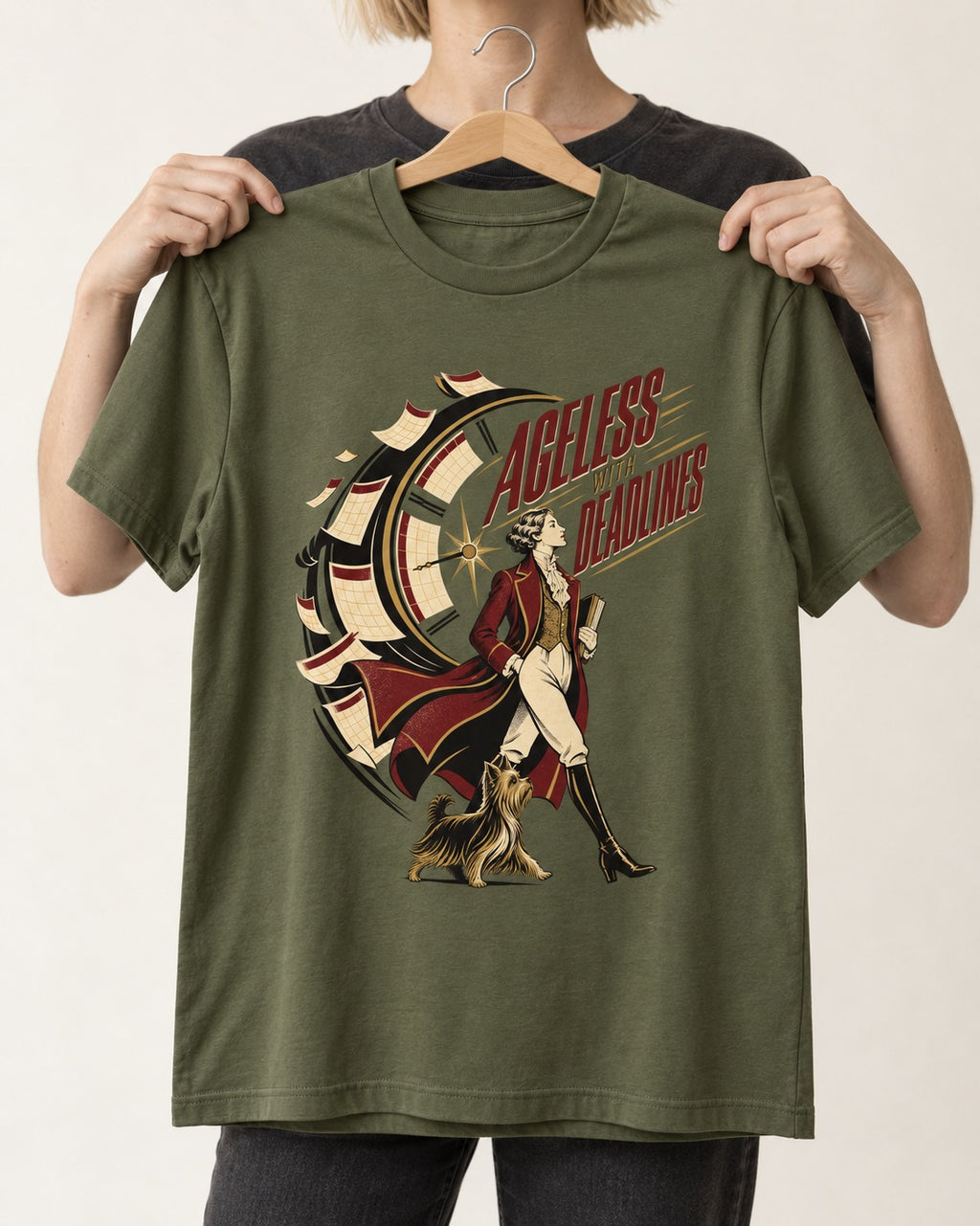 Yorkshire Terrier Ageless with Deadlines Calendar Clock Graphic T-Shirt in Heather Military Green, held up on a hanger
