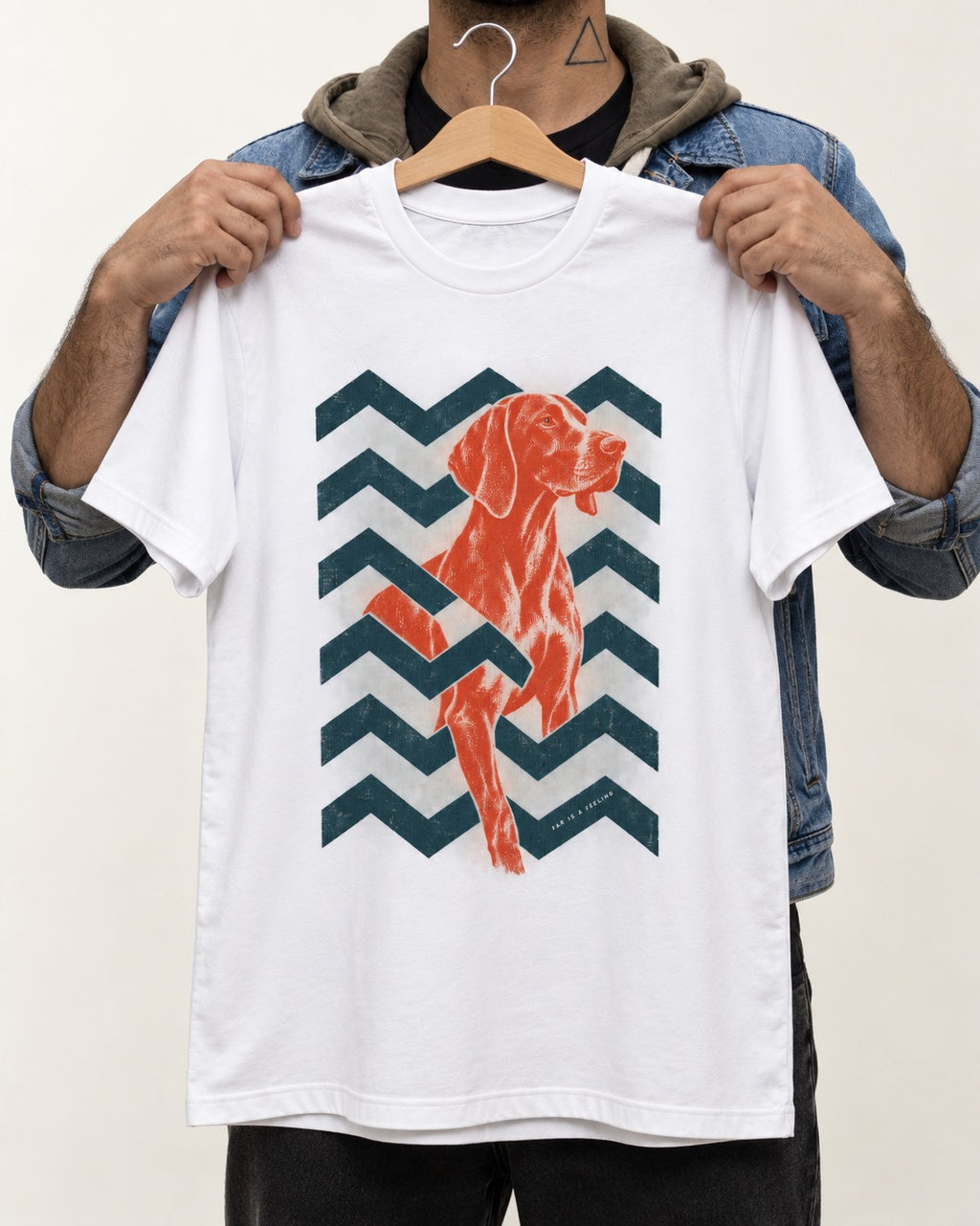 German Shorthaired Pointer Far Is a Feeling Chevron Graphic T-Shirt in White, held up on a hanger