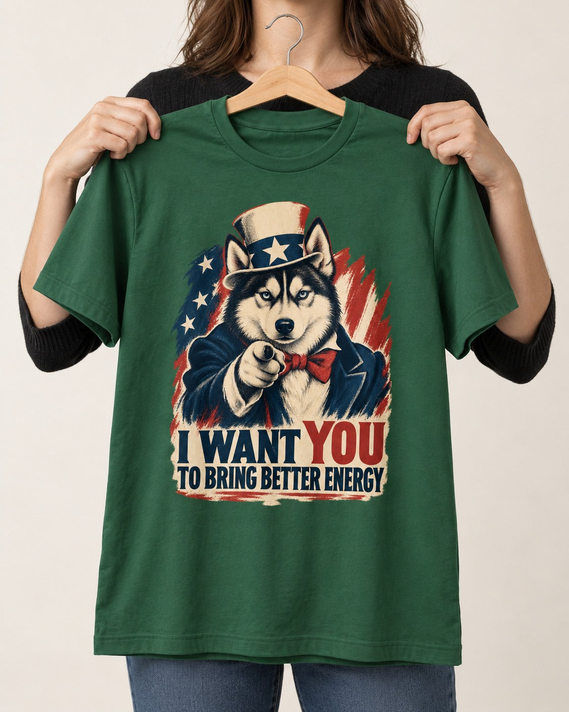 Husky I Want You to Bring Better Energy Patriotic Poster Graphic T-Shirt in Forest Green, held up on a hanger