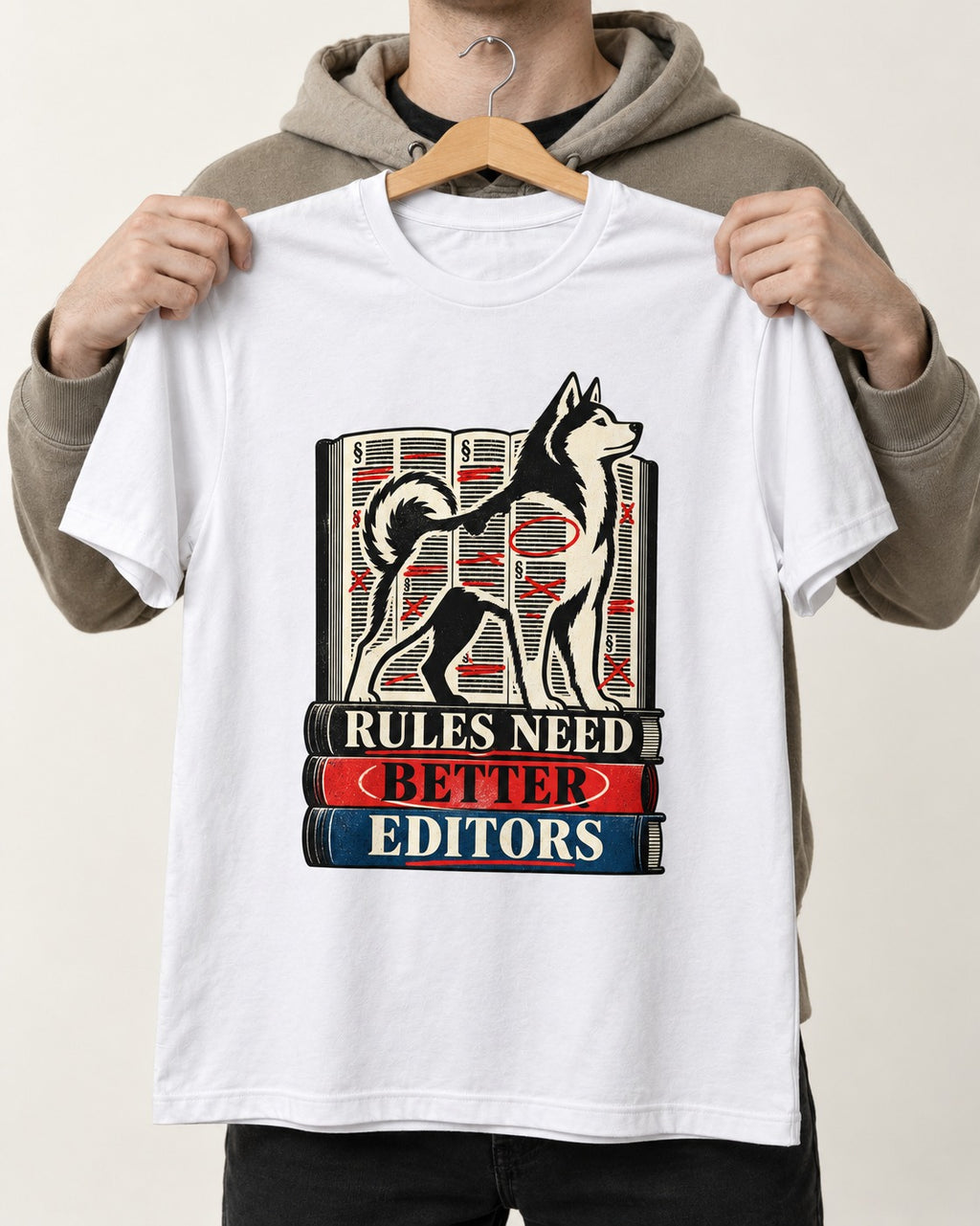 Husky Rules Need Better Editors Book Stack Graphic T-Shirt in White, held up on a hanger