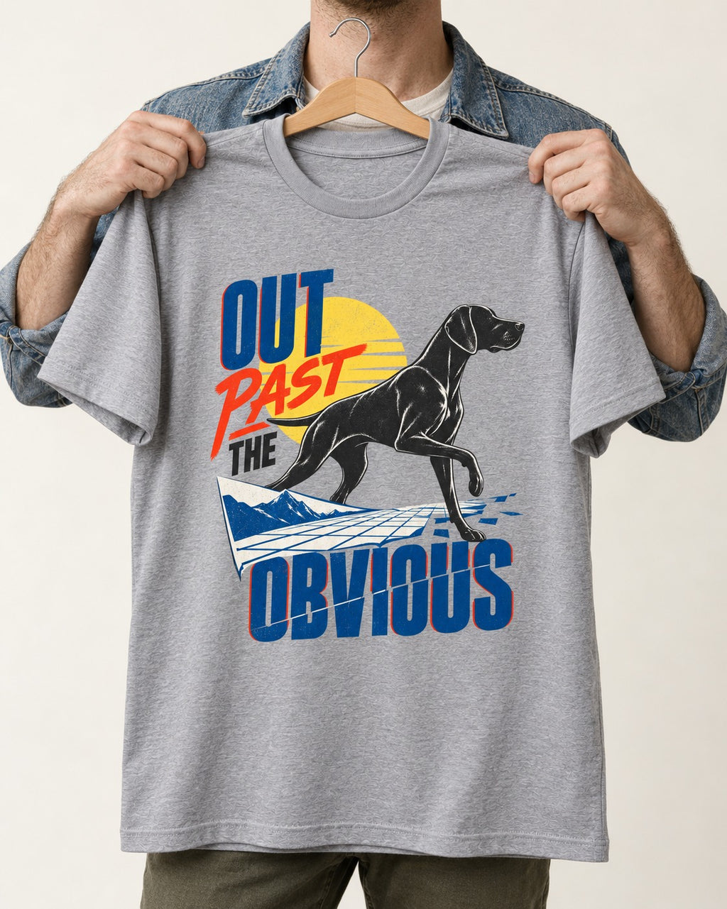 Out Past the Obvious German Shorthaired Pointer T-Shirt in Sport Grey, held up on a hanger