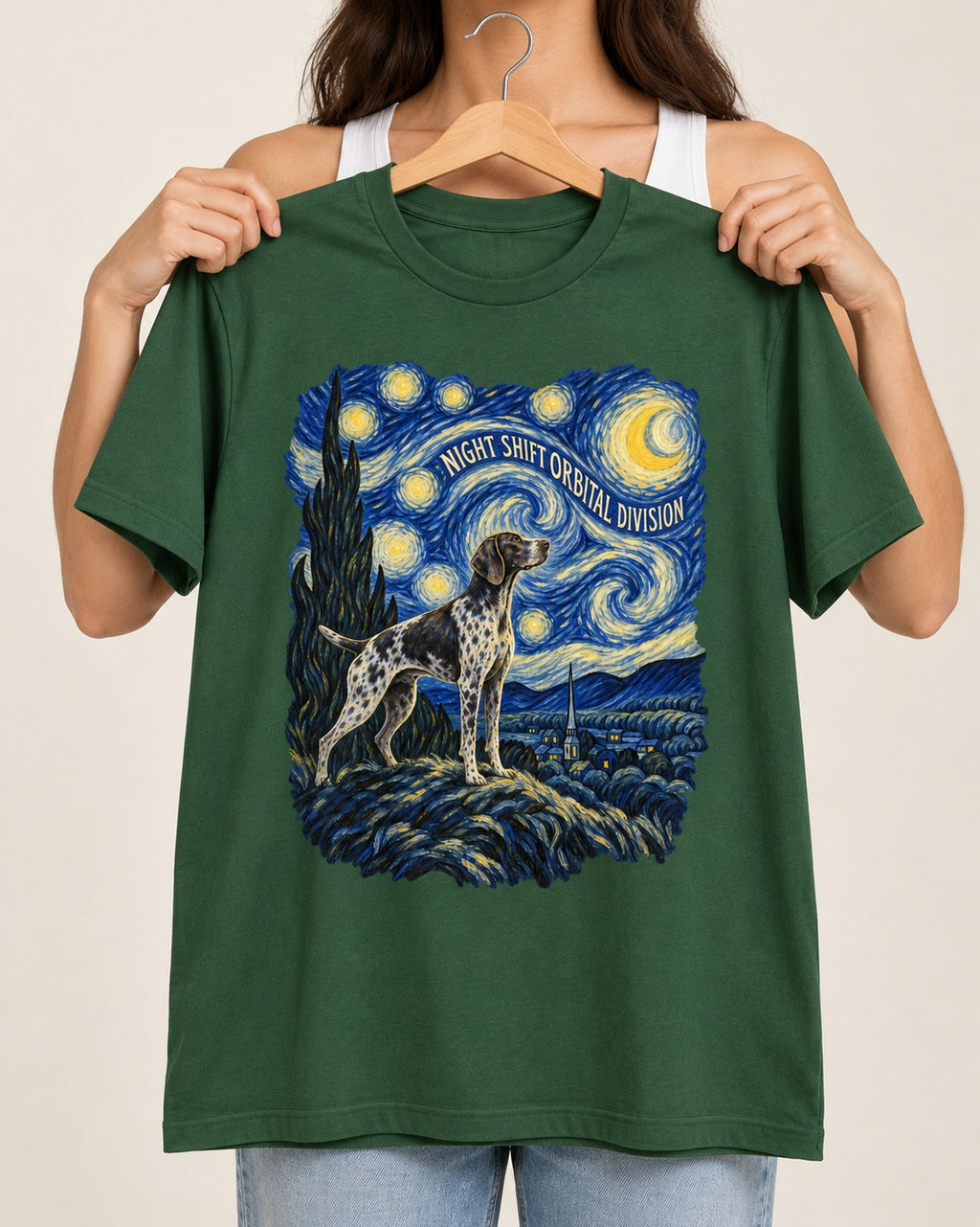 German Shorthaired Pointer Night Shift Orbital Division Starry Night Graphic T-Shirt in Forest Green, held up on a hanger