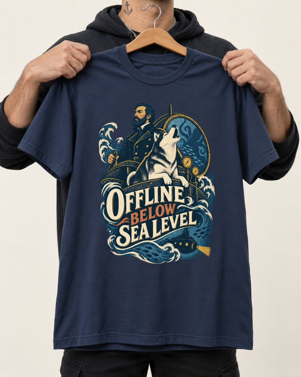 Husky Offline Below Sea Level Nautical Submarine Graphic T-Shirt in Navy, held up on a hanger