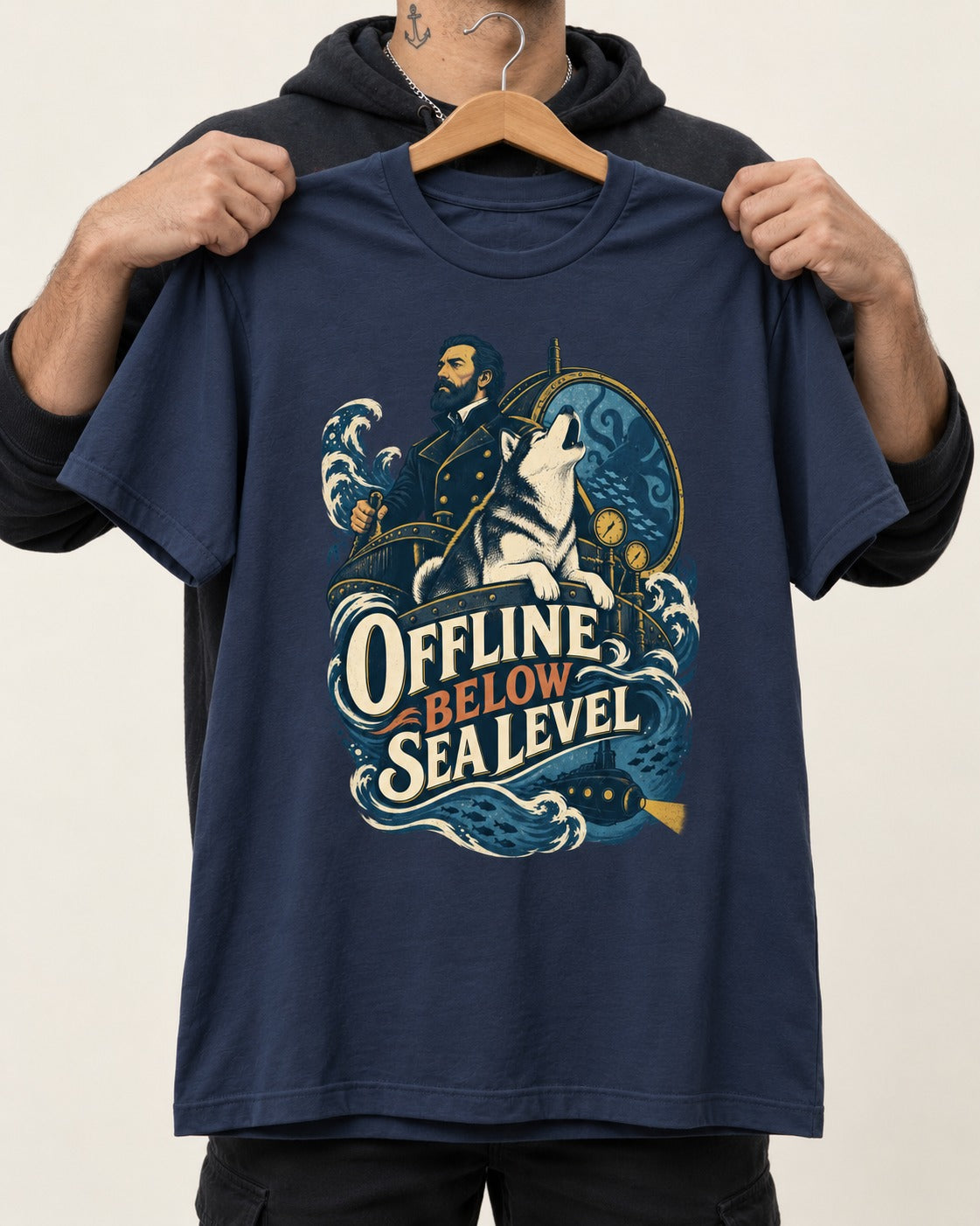 Husky Offline Below Sea Level Nautical Submarine Graphic T-Shirt in Navy, held up on a hanger
