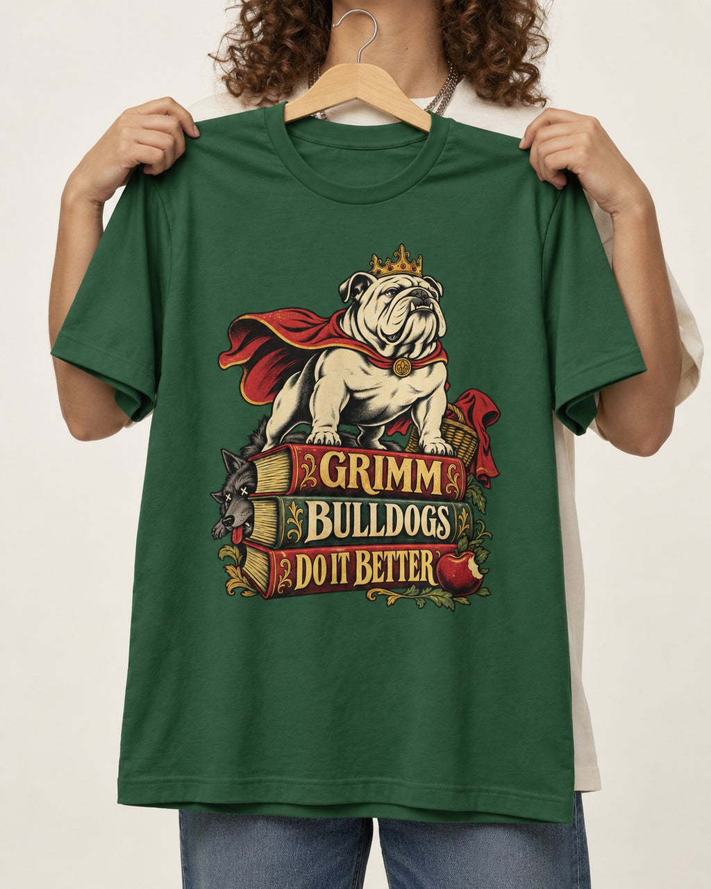 English Bulldog Grimm Bulldogs Do It Better Storybook Graphic T-Shirt in Forest Green, held up on a hanger
