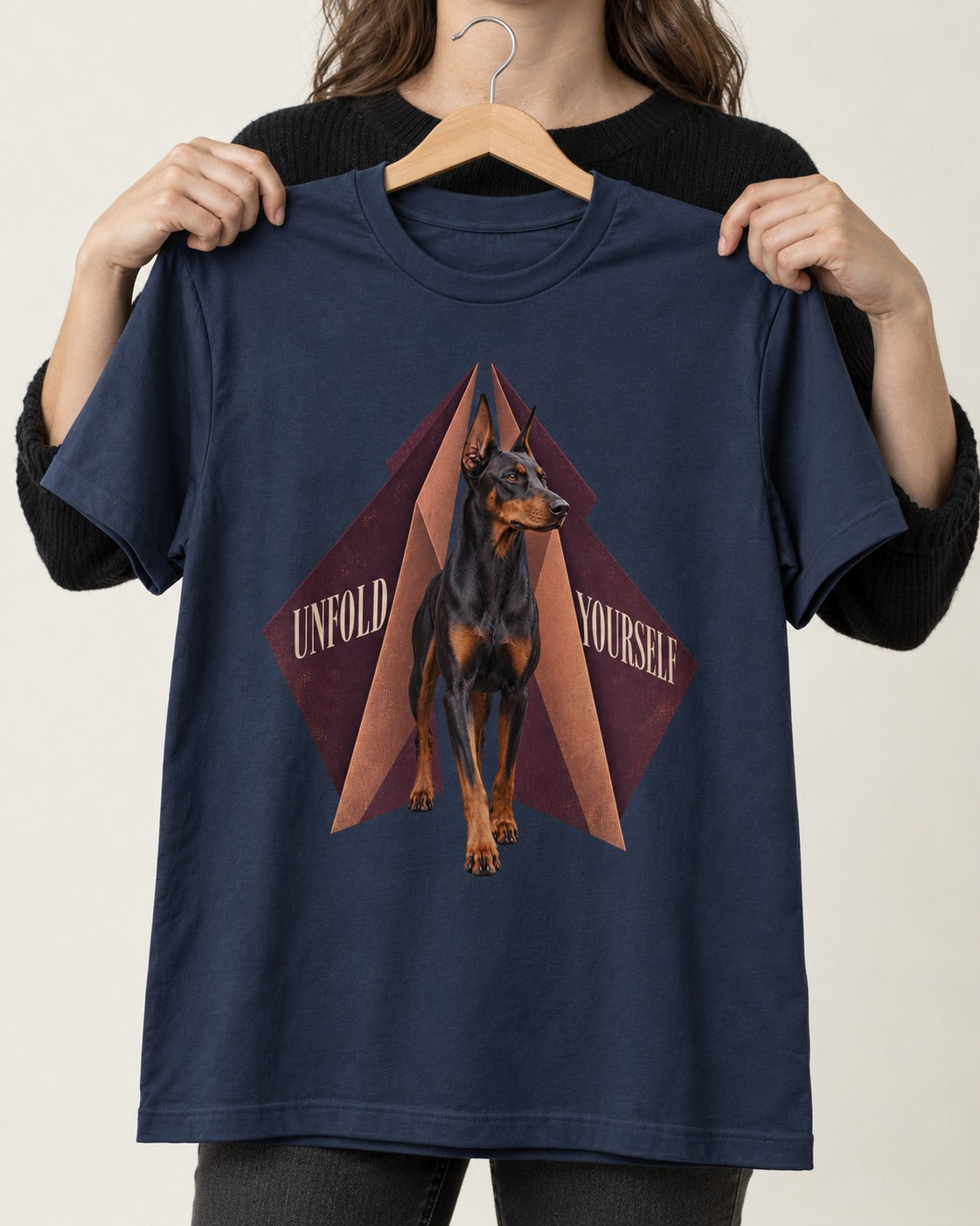 Doberman Unfold Yourself Geometric Portrait Graphic T-Shirt in Navy, held up on a hanger