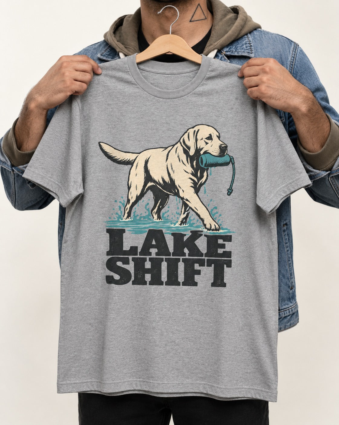 Lake Shift Labrador Retriever T-Shirt in Sport Grey, held up on a hanger