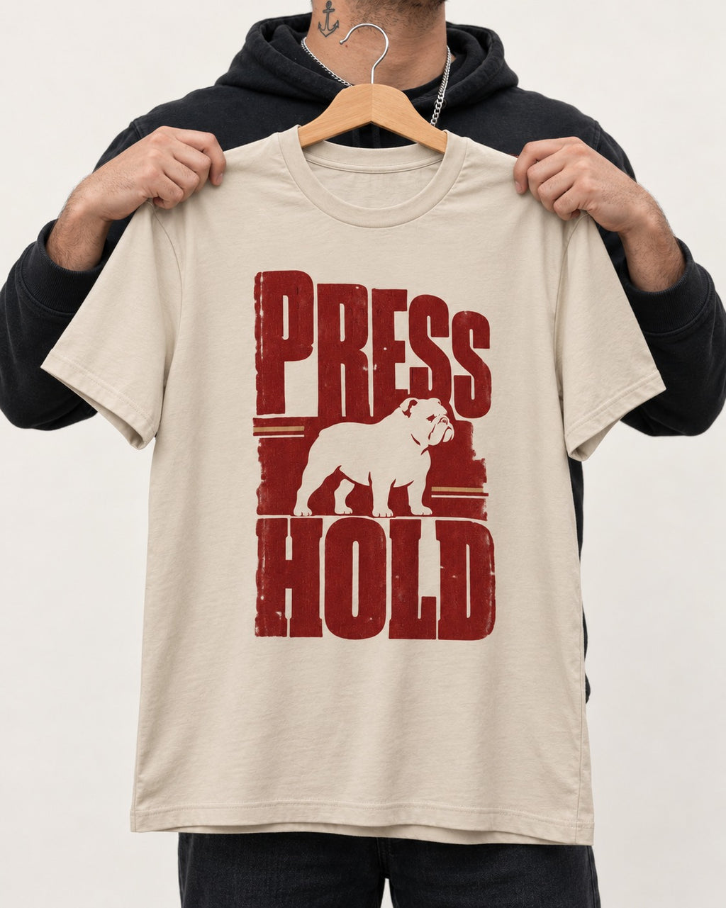 English Bulldog Press and Hold T-Shirt in Sand, held up on a hanger