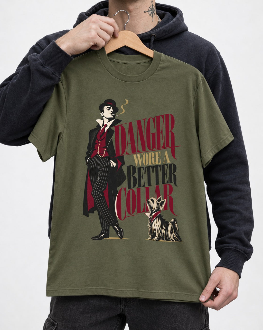 Yorkshire Terrier Danger Wore a Better Collar Art Deco Graphic T-Shirt in Heather Military Green, held up on a hanger