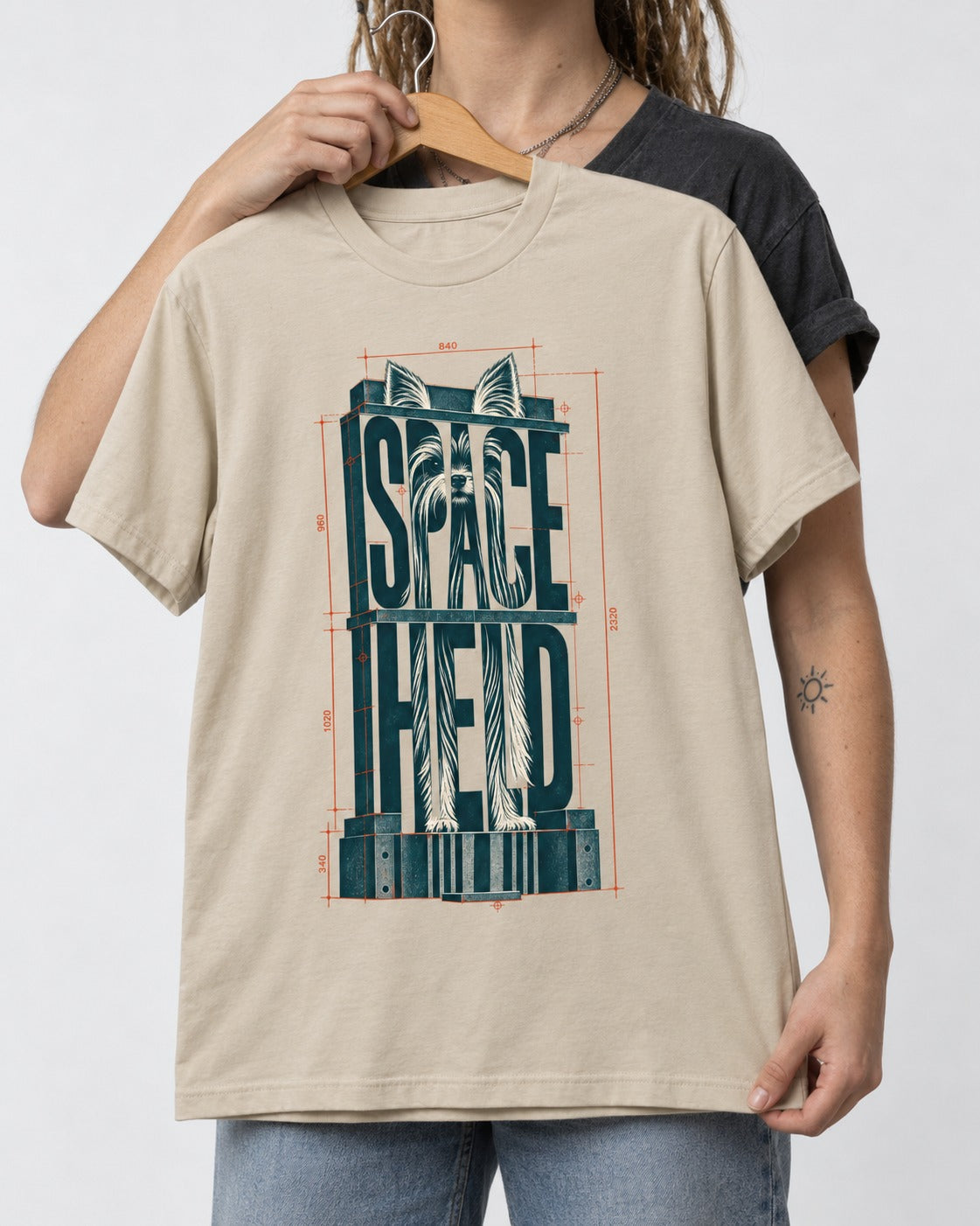 Yorkshire Terrier Space Head T-Shirt in Sand, held up on a hanger