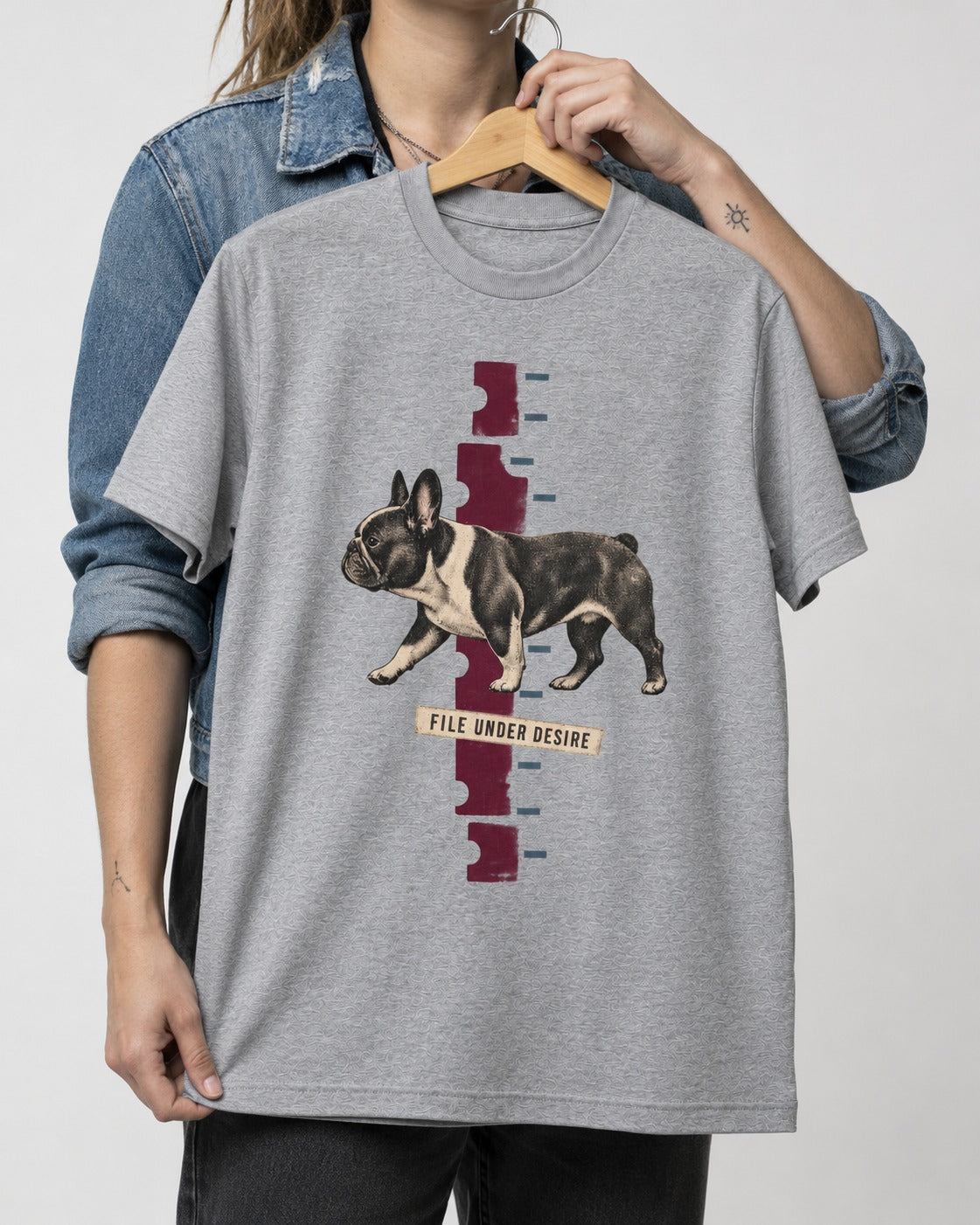 File Under Frenchie Desire T-Shirt in Sport Grey, held up on a hanger