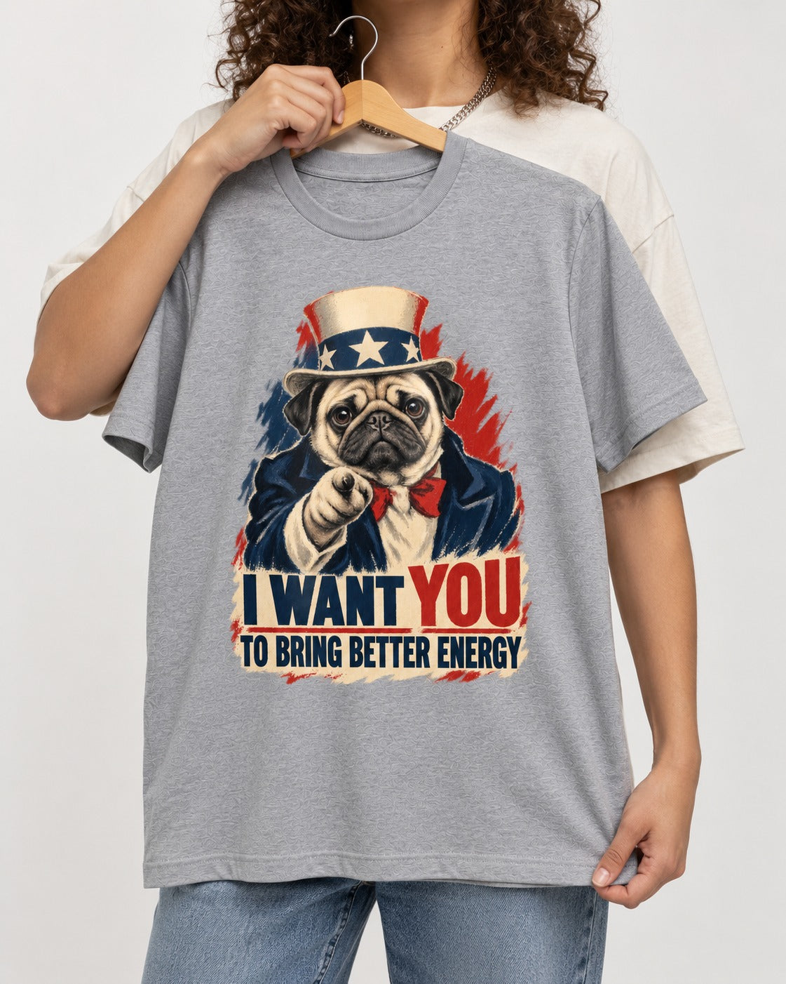 Pug I Want You to Bring Better Energy Uncle Sam Graphic T-Shirt in Sport Grey, held up on a hanger