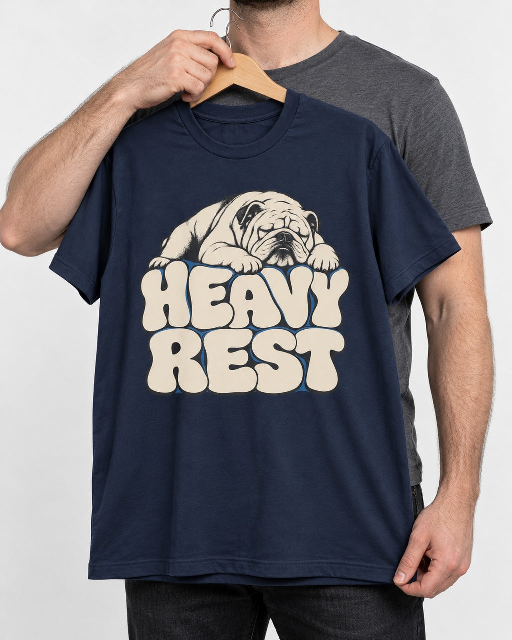 English Bulldog Heavy Rest Graphic T-Shirt in Navy, held up on a hanger