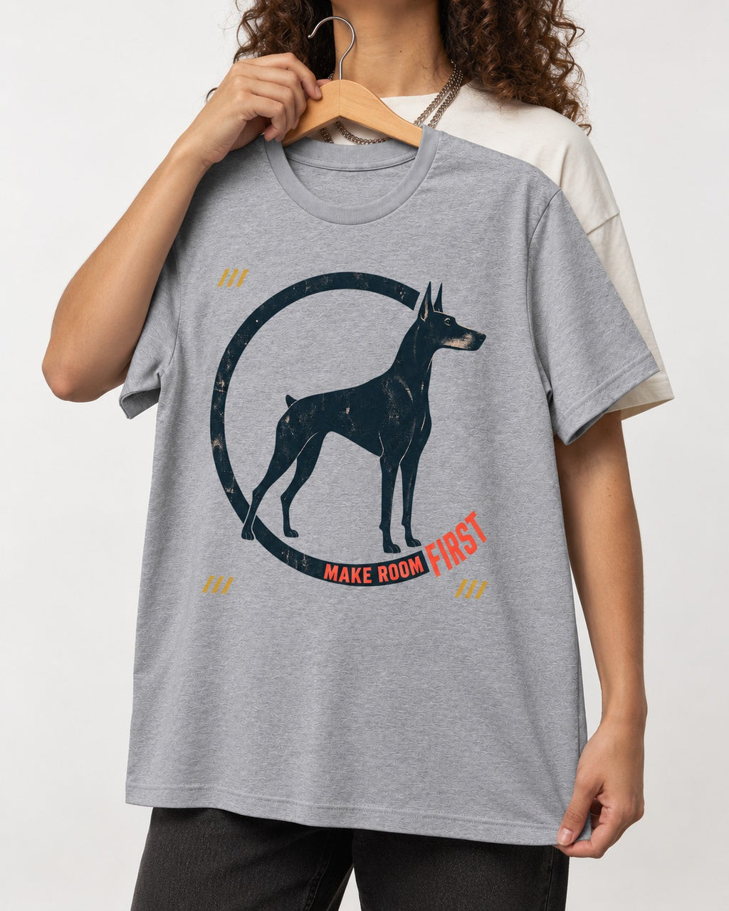 Make Room First Doberman T-Shirt in Sport Grey, held up on a hanger