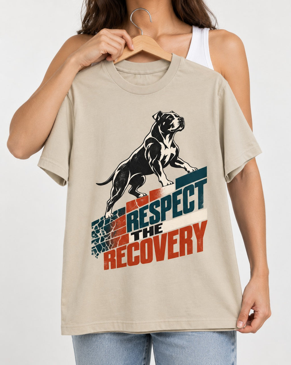 Pitbull Respect the Recovery T-Shirt in Sand, held up on a hanger