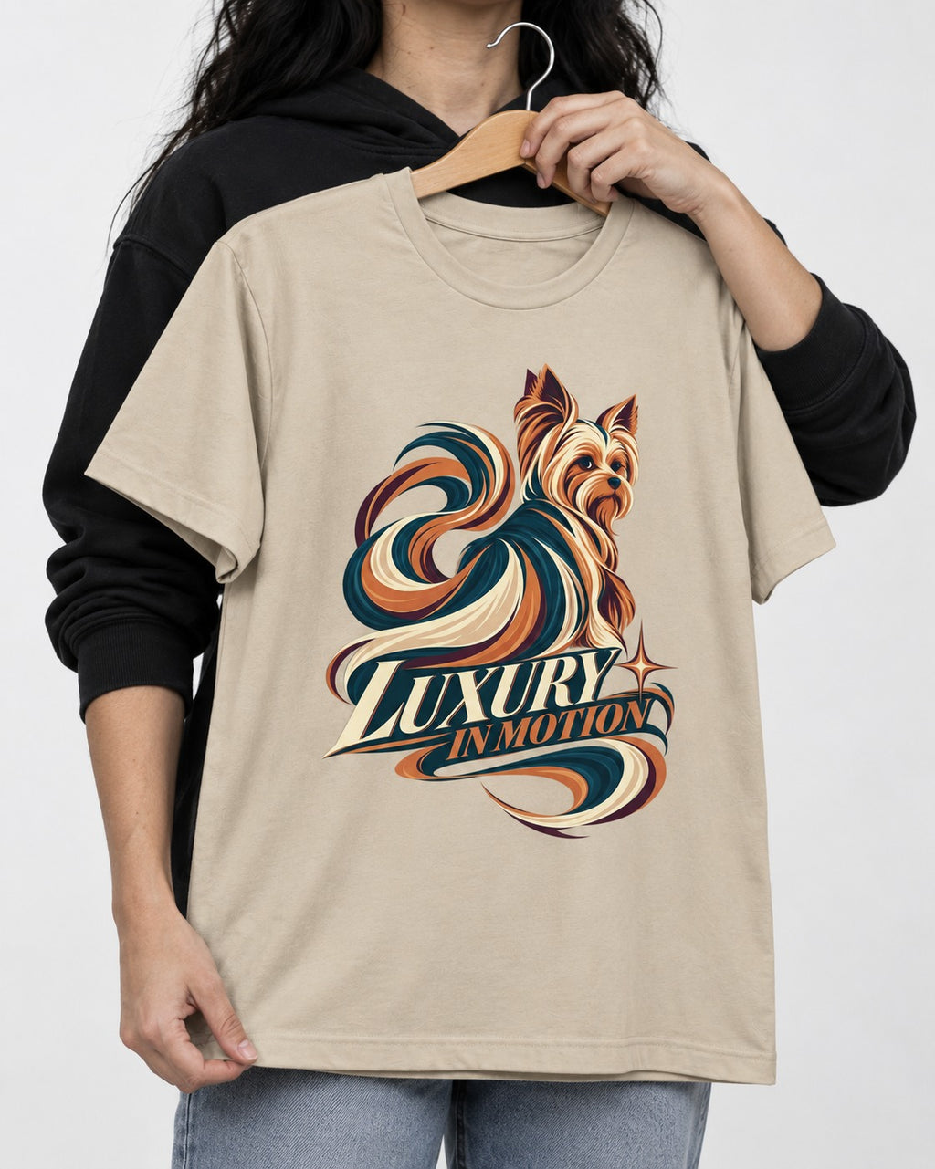 Yorkshire Terrier Luxury in Motion T-Shirt in Sand, held up on a hanger