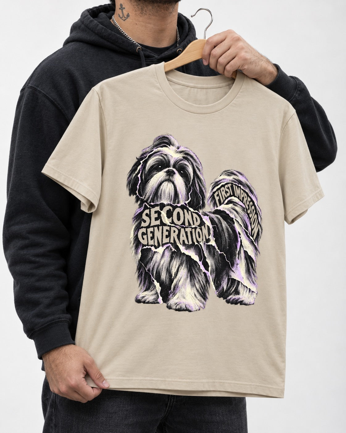 Second Generation Shih Tzu T-Shirt in Sand, held up on a hanger