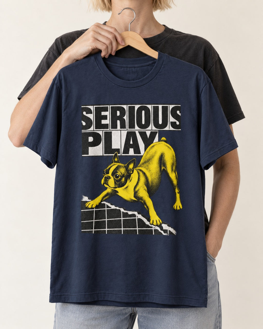 Boston Terrier Serious Play Agility Graphic T-Shirt in Navy, held up on a hanger