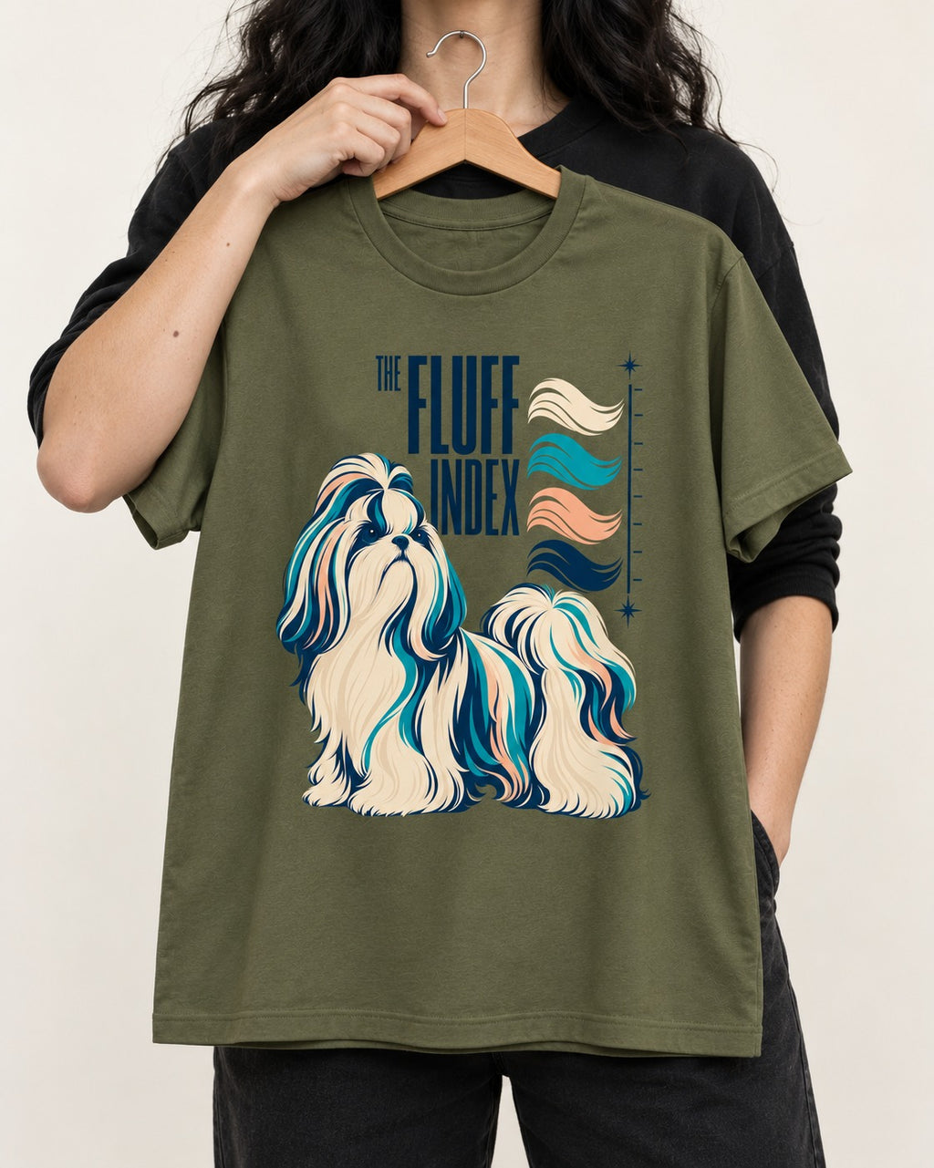 Shih Tzu The Fluff Index Coat Color Chart Graphic T-Shirt in Heather Military Green, held up on a hanger