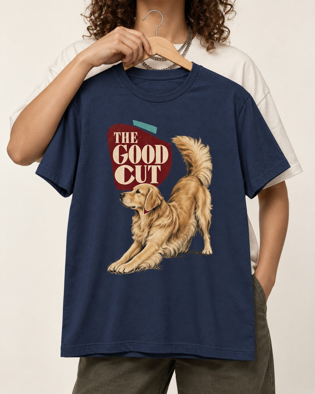 Golden Retriever The Good Cut Play Bow Graphic T-Shirt in Navy, held up on a hanger