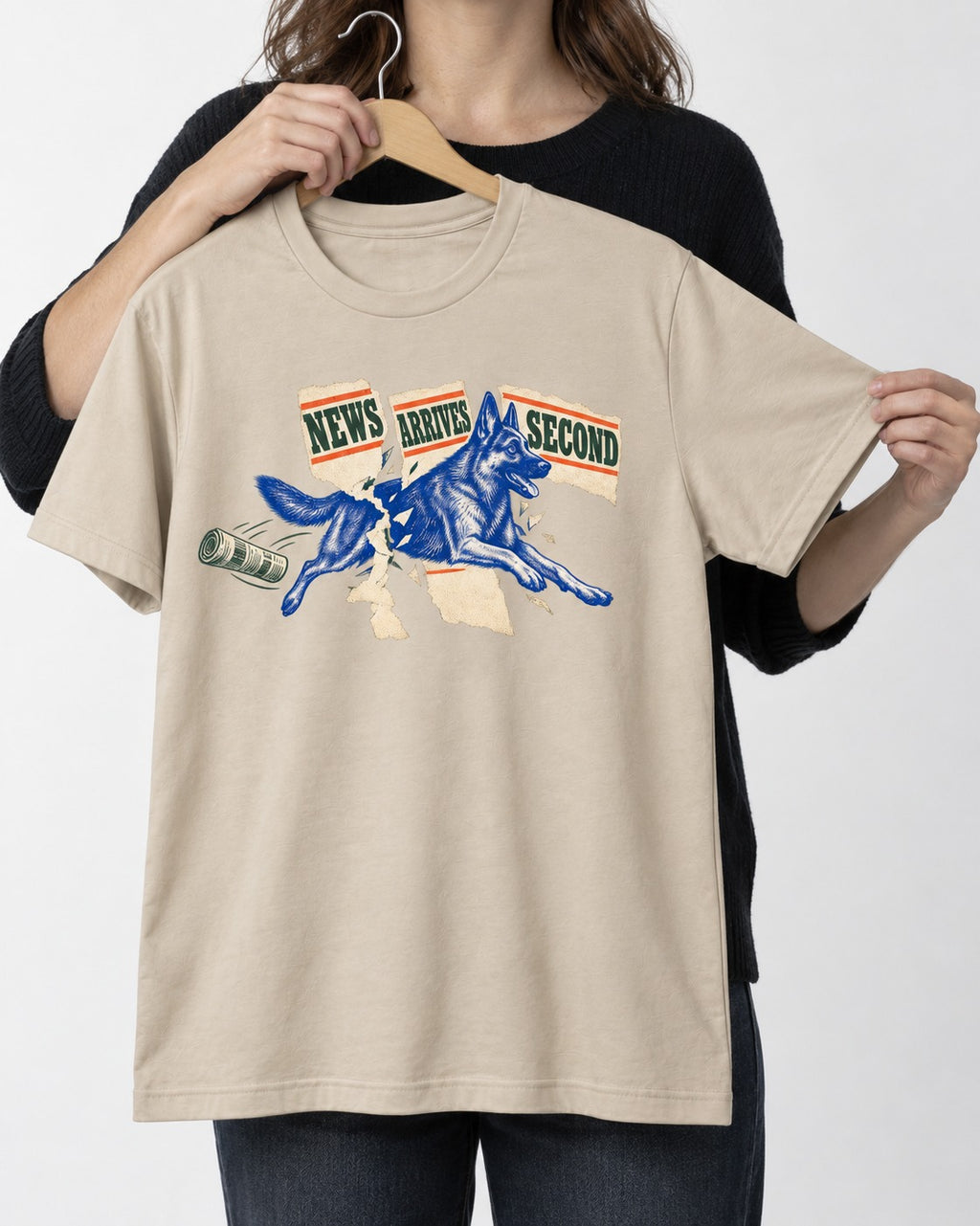 News Arrives Second German Shepherd Dog T-Shirt in Sand, held up on a hanger