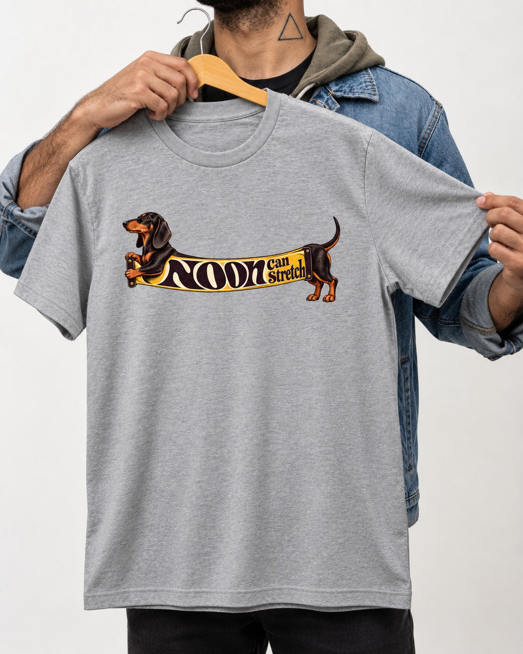 Dachshund Noon Can Stretch Sign Graphic T-Shirt in Sport Grey, held up on a hanger